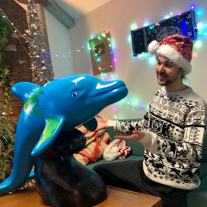 Yogscast Co-Founder Lewis with Todd the dolphin